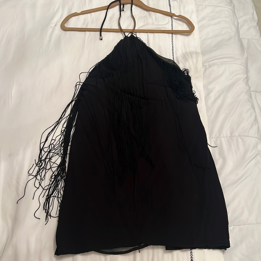 black dress with tassels